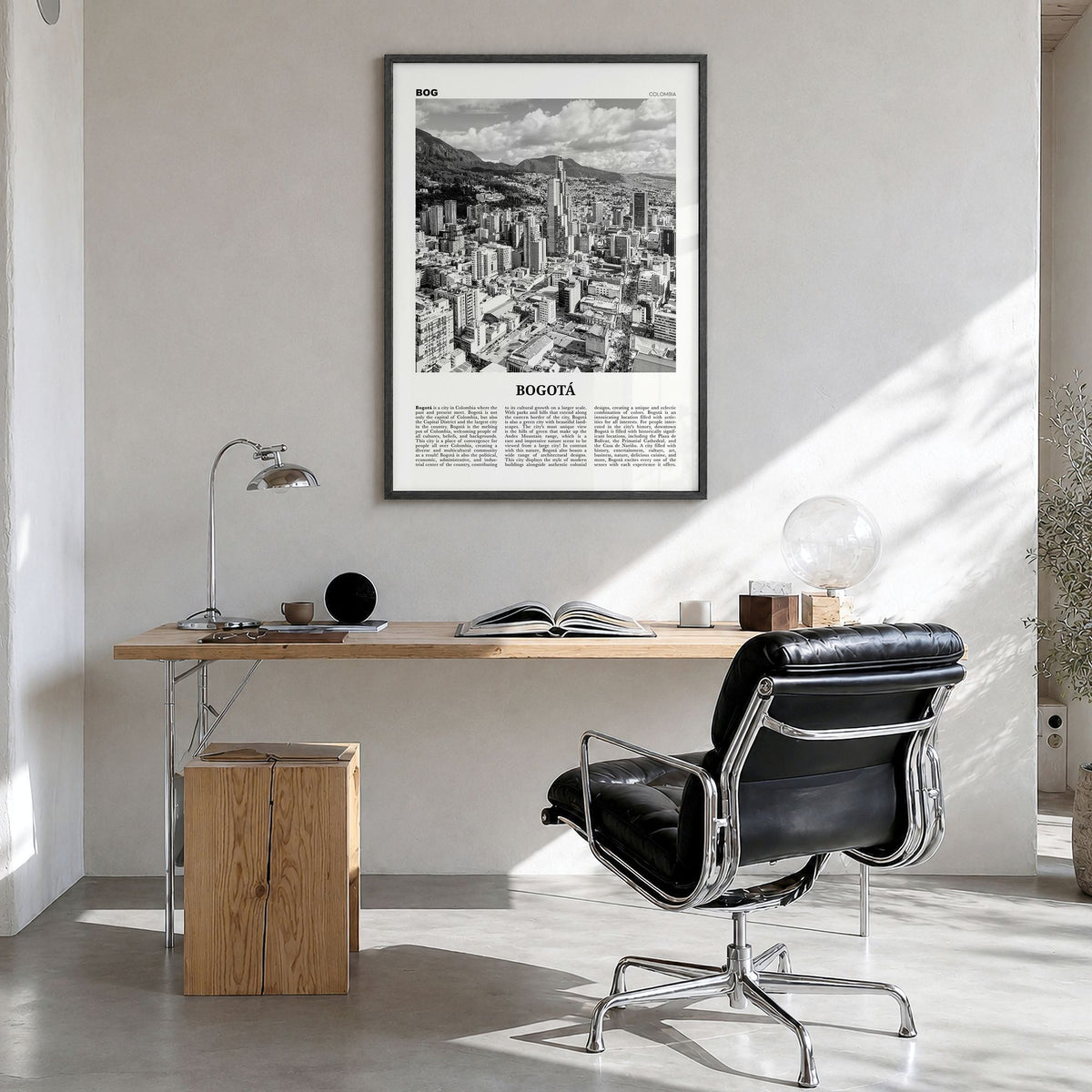 Bogotá Newspaper No 1 Poster in a black wood frame, hanging in a bright home office