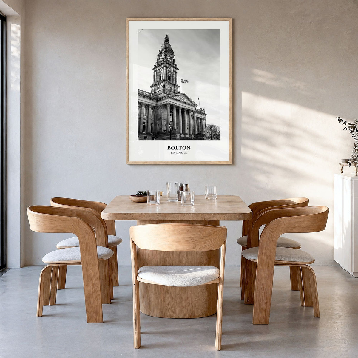 Bolton Classic Poster in a natural wood frame, hanging in a dining room