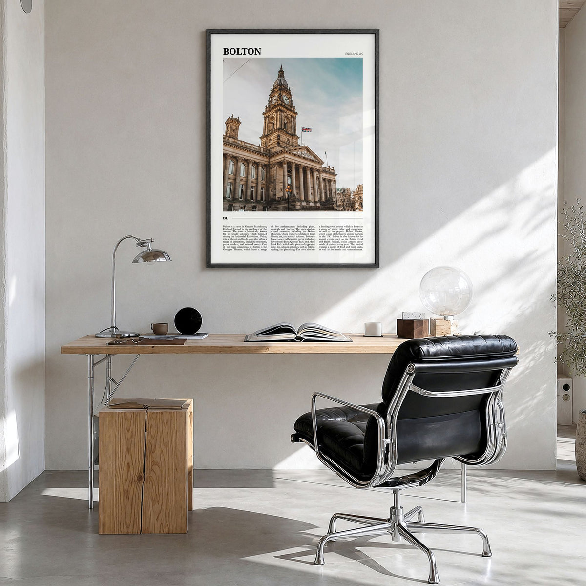 Bolton Travel Poster in a black wood frame, hanging in a bright home office