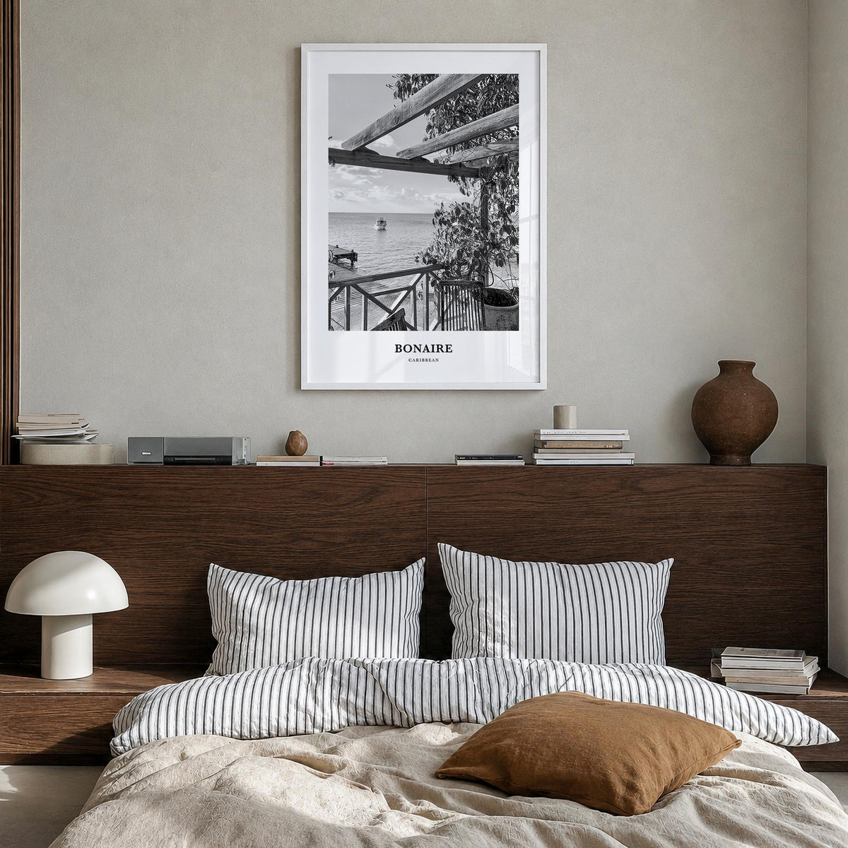 Bonaire black & white classic poster of Caribbean – vertical wall art in white wood frame, hanging on wall