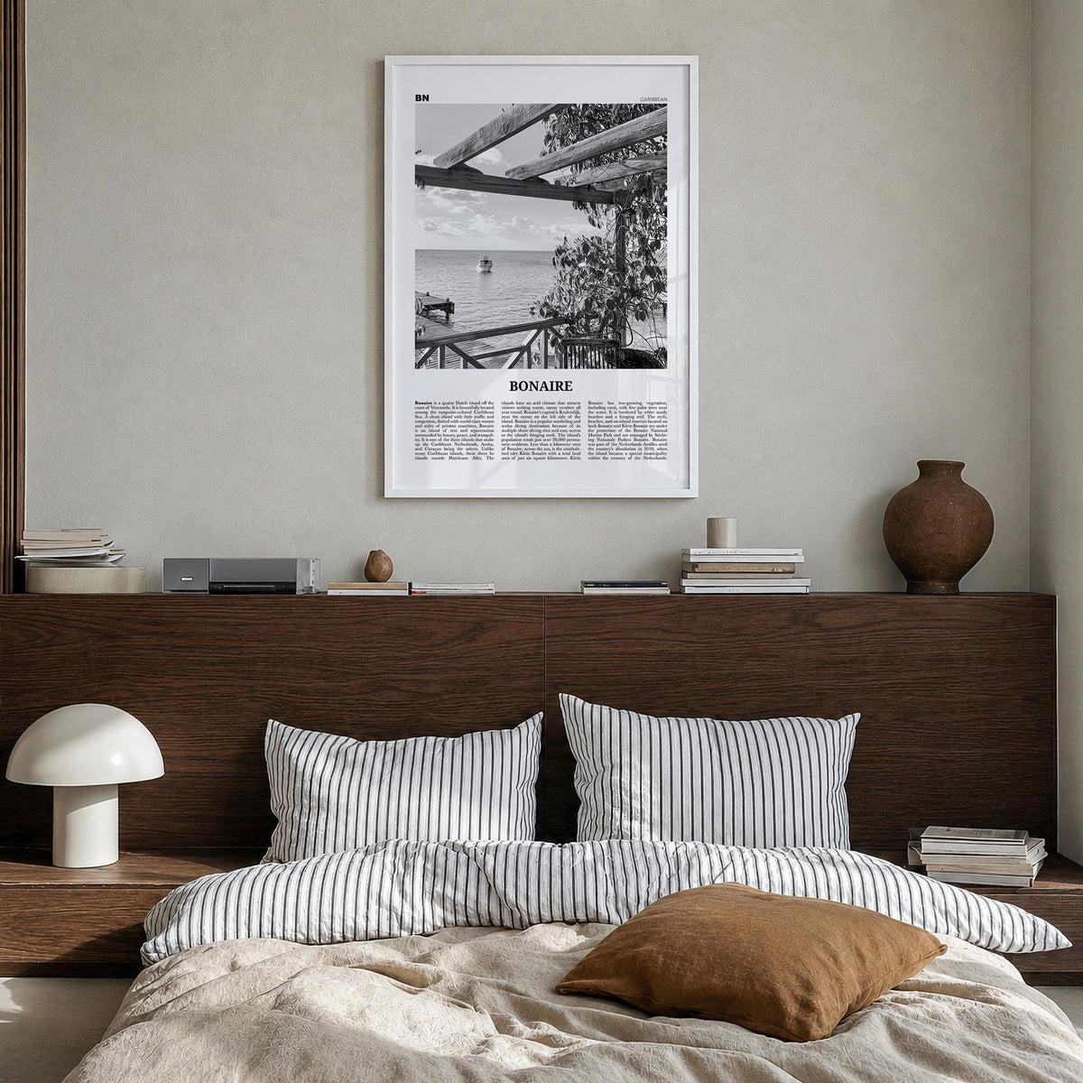 Bonaire black & white newspaper poster of Caribbean – vertical wall art in white wood frame, hanging on wall