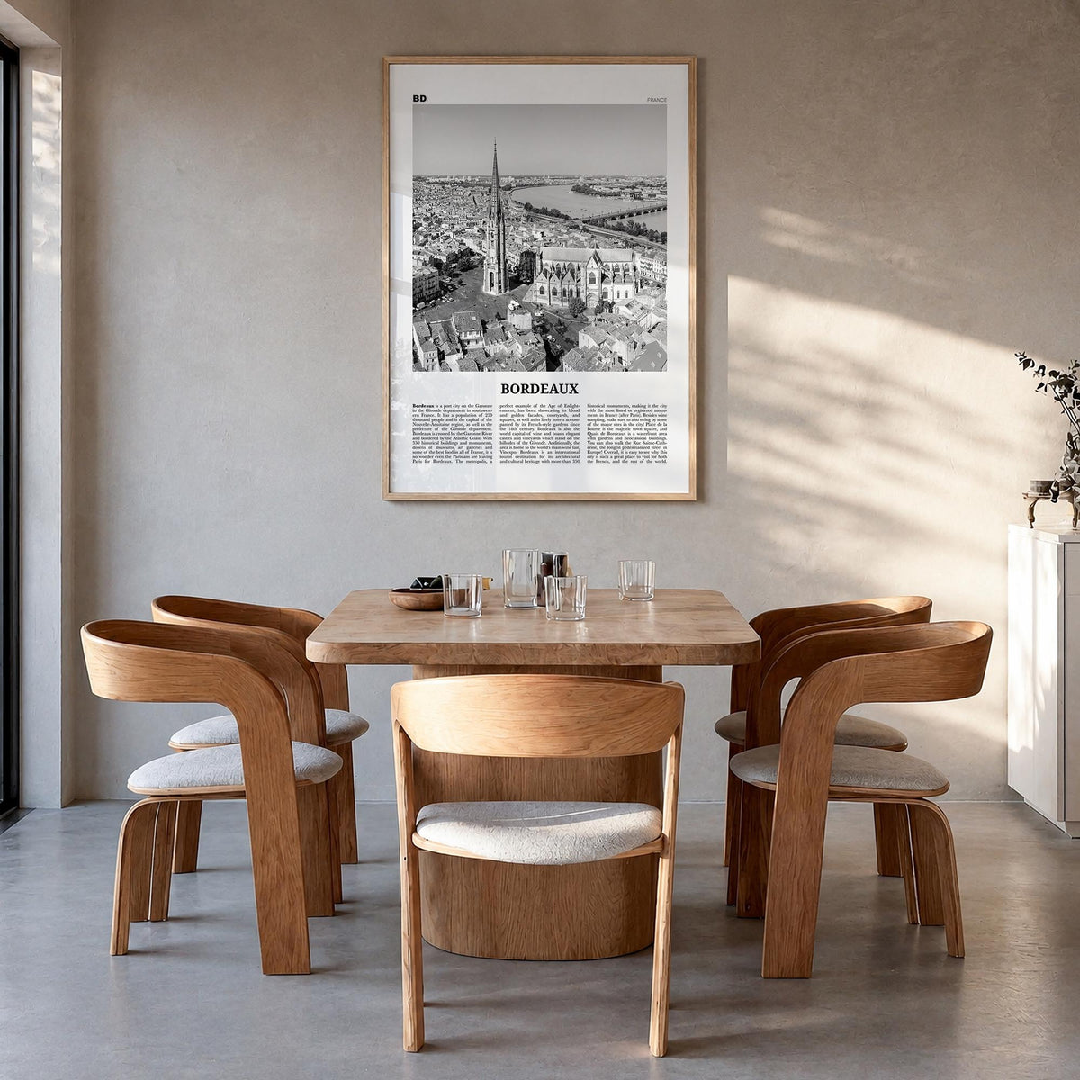 Bordeaux no. 1 black & white newspaper poster of France – vertical wall art in natural wood frame, hanging on wall