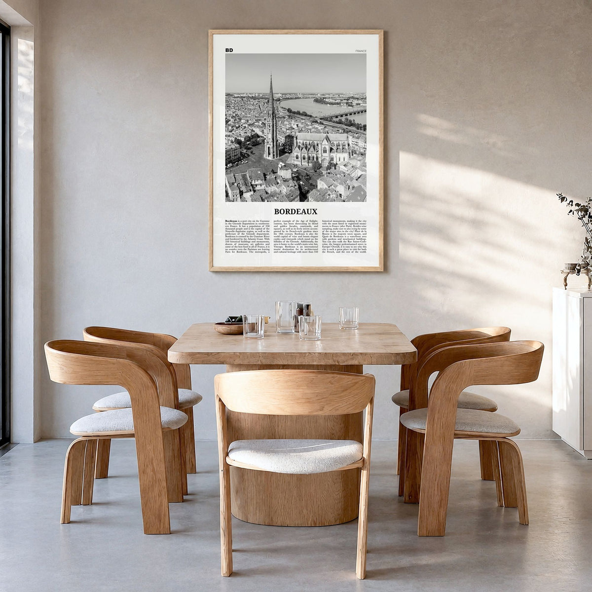 Bordeaux Newspaper No 1 Poster in a natural wood frame, hanging in a dining room