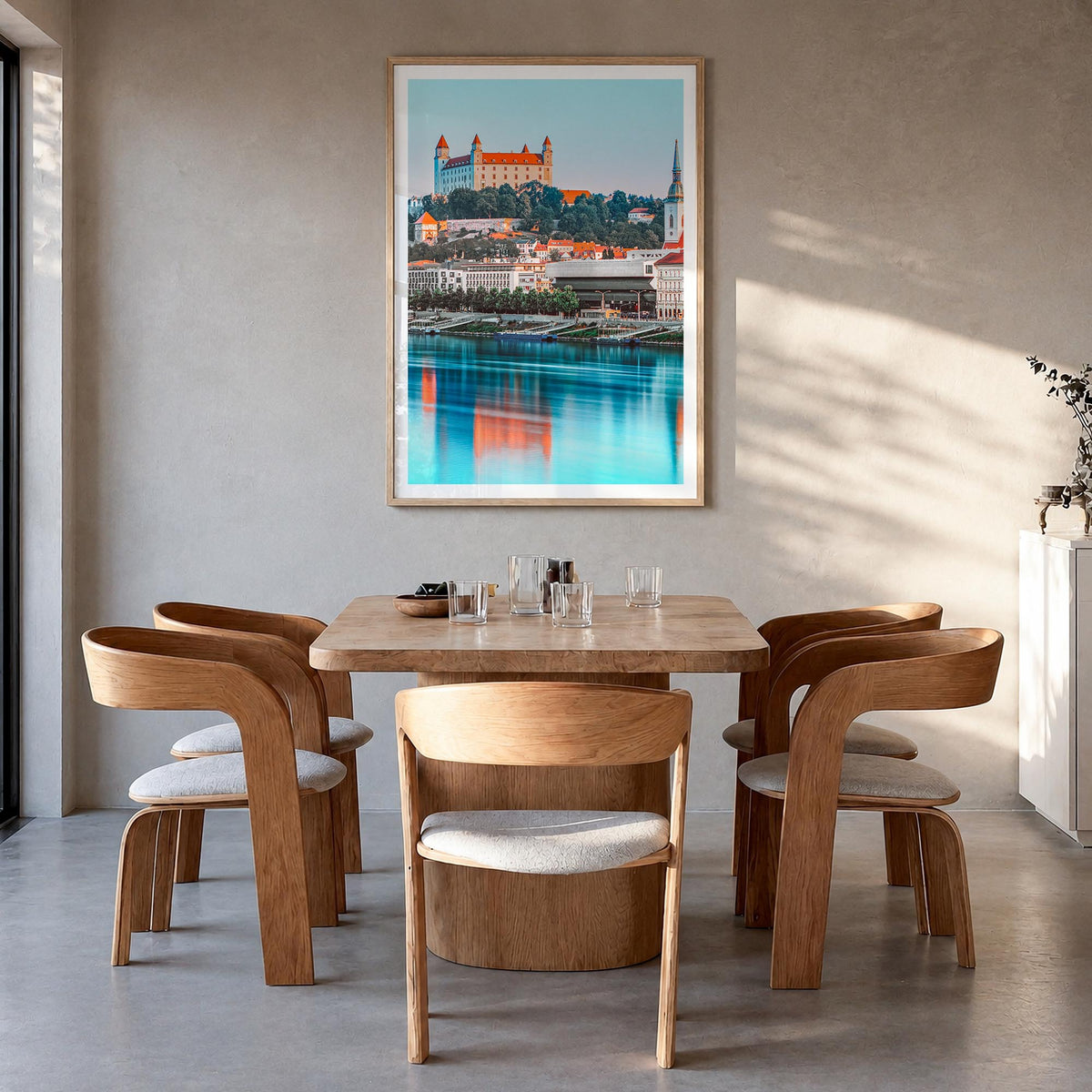 Bratislava colorful photo poster of Slovakia – vertical wall art in natural wood frame with white border, hanging on wall