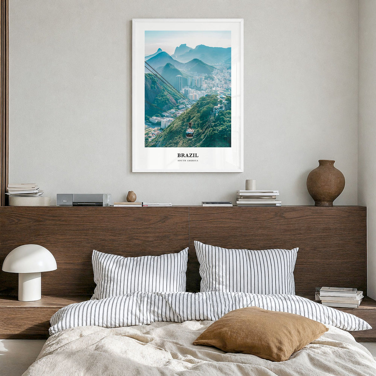 Brazil Classic No 1 Poster in a white wood frame, hanging in a bedroom