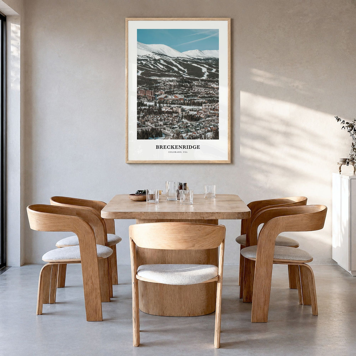 Breckenridge Classic No 2 Poster in a natural wood frame, hanging in a dining room