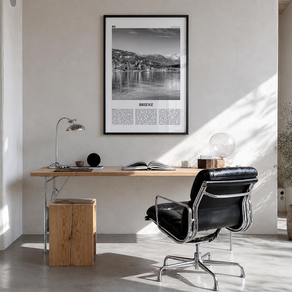 Brienz black & white newspaper poster of Switzerland – vertical wall art in black wood frame, hanging on wall