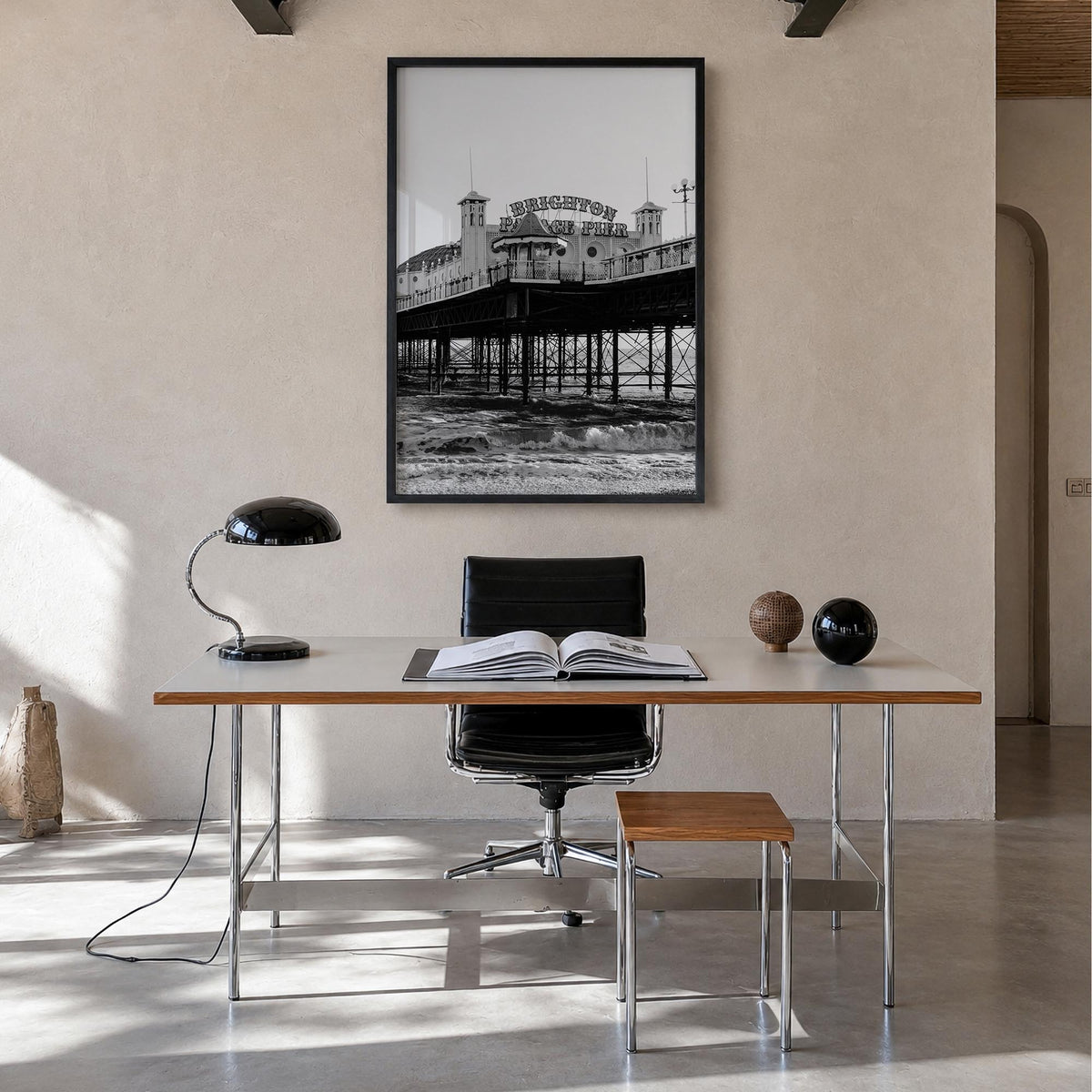 Brighton black & white photo poster of England, UK – vertical wall art in black wood frame, hanging on wall