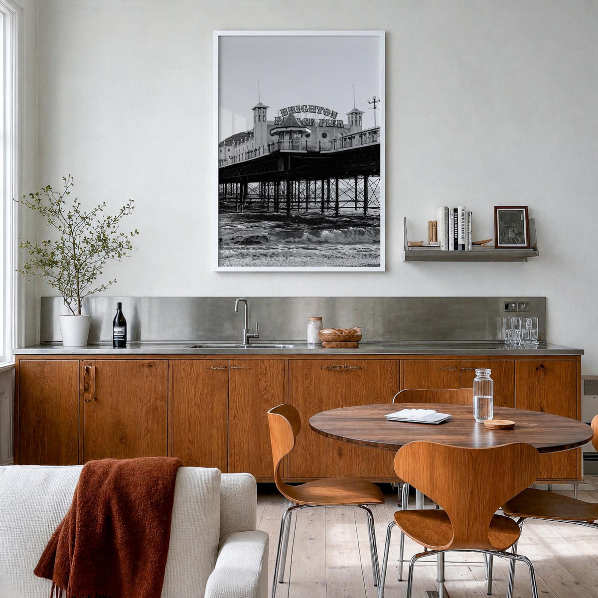 Brighton black & white photo poster of England, UK – vertical wall art in white wood frame, hanging on wall