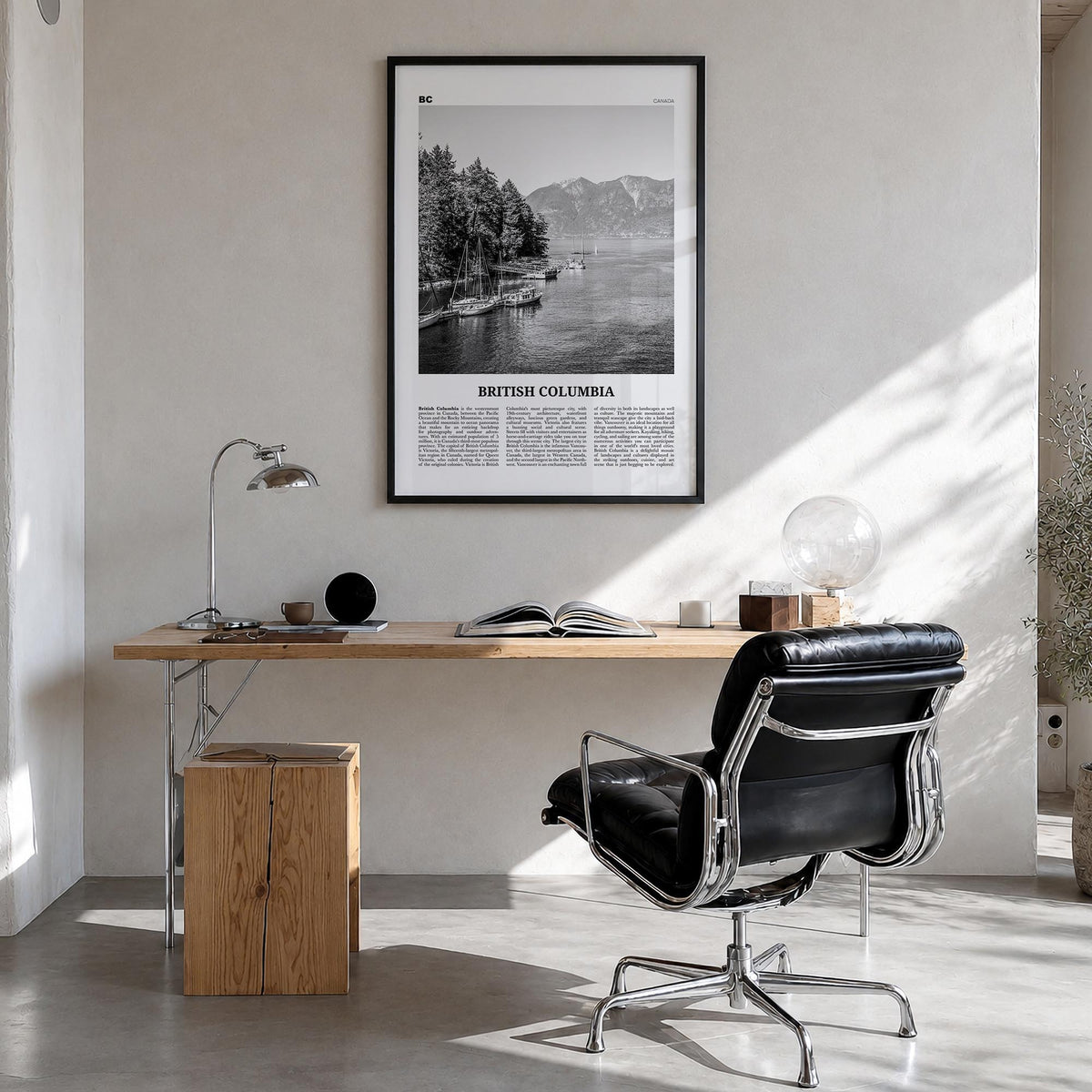 British Columbia black & white newspaper poster of Canada – vertical wall art in black wood frame, hanging on wall