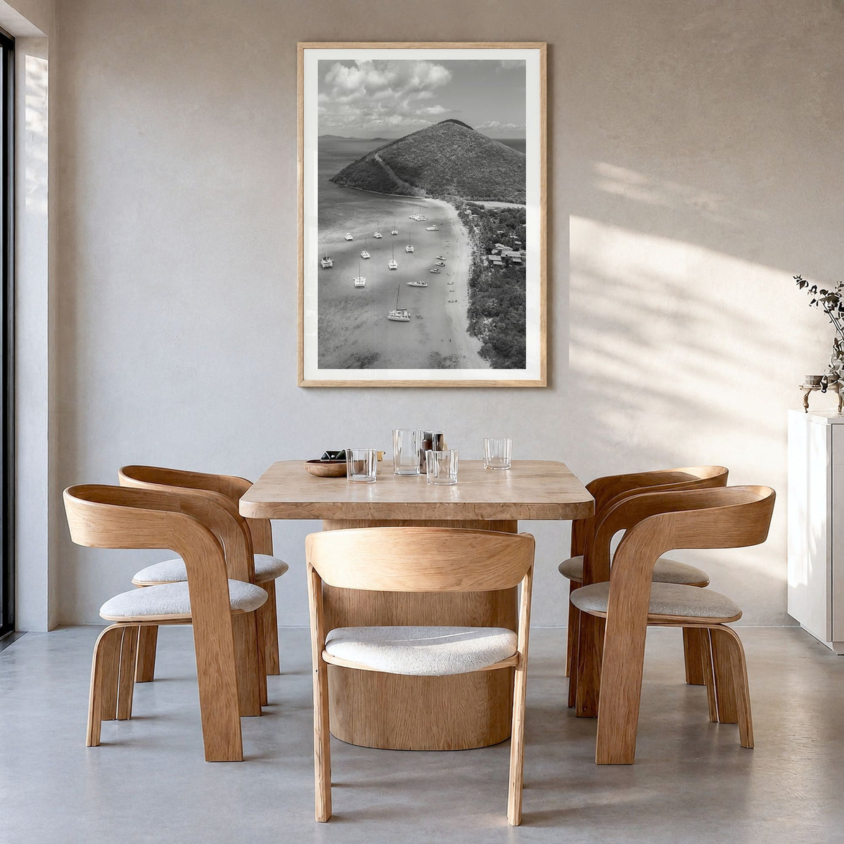 British Virgin Islands Photo Poster in a natural wood frame, hanging in a dining room, white border