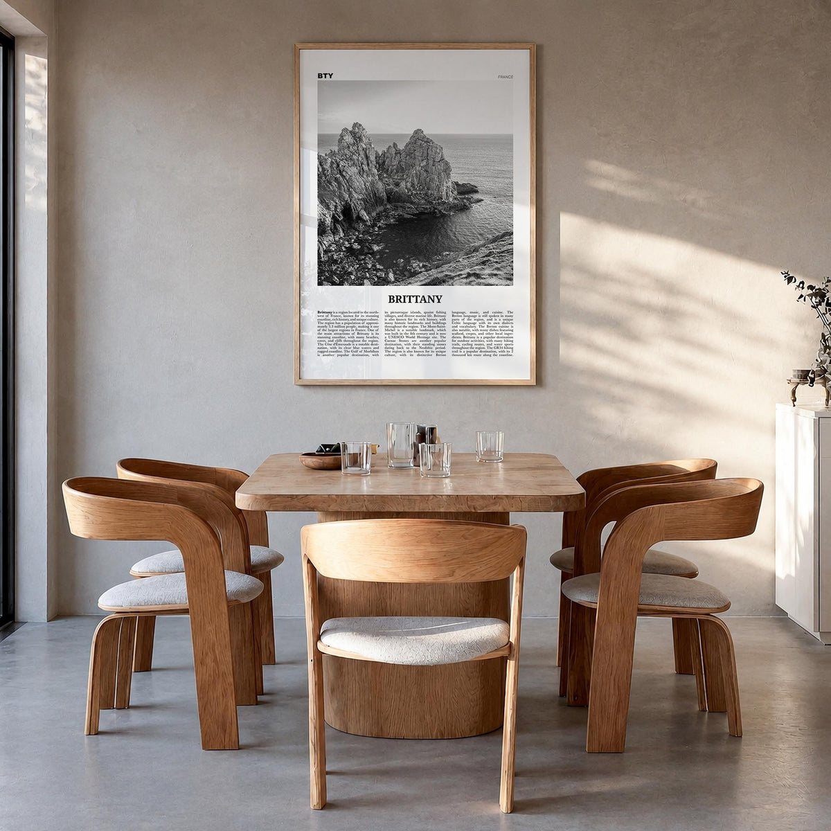 Brittany black & white newspaper poster of France – vertical wall art in natural wood frame, hanging on wall