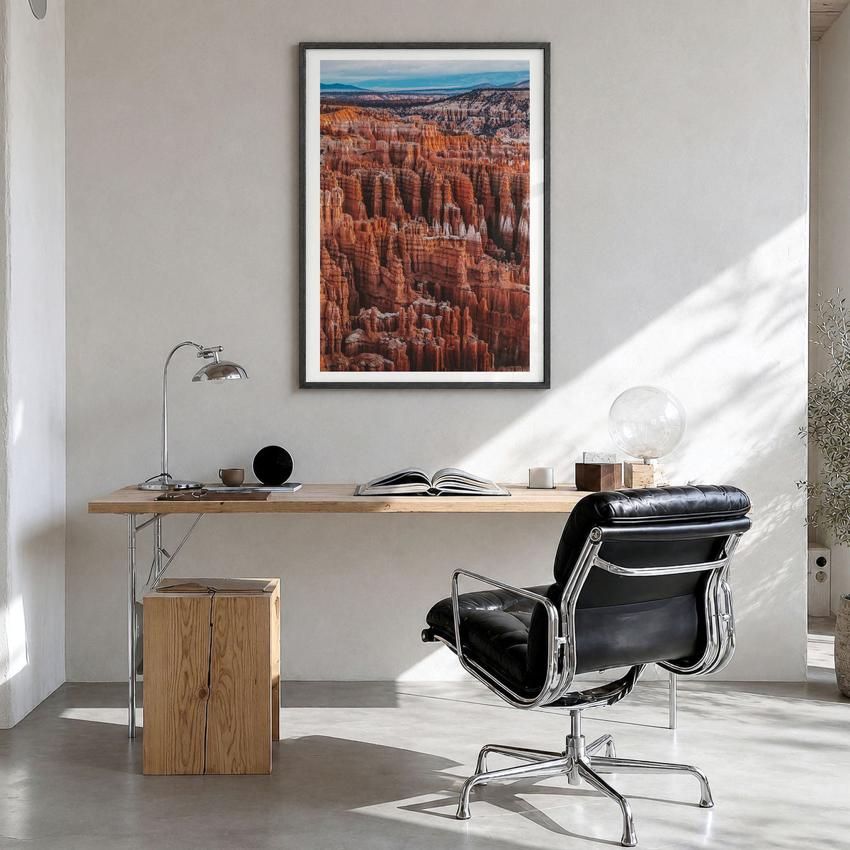 Bryce Canyon National Park Photo Poster in a black wood frame, hanging in a bright home office, white border