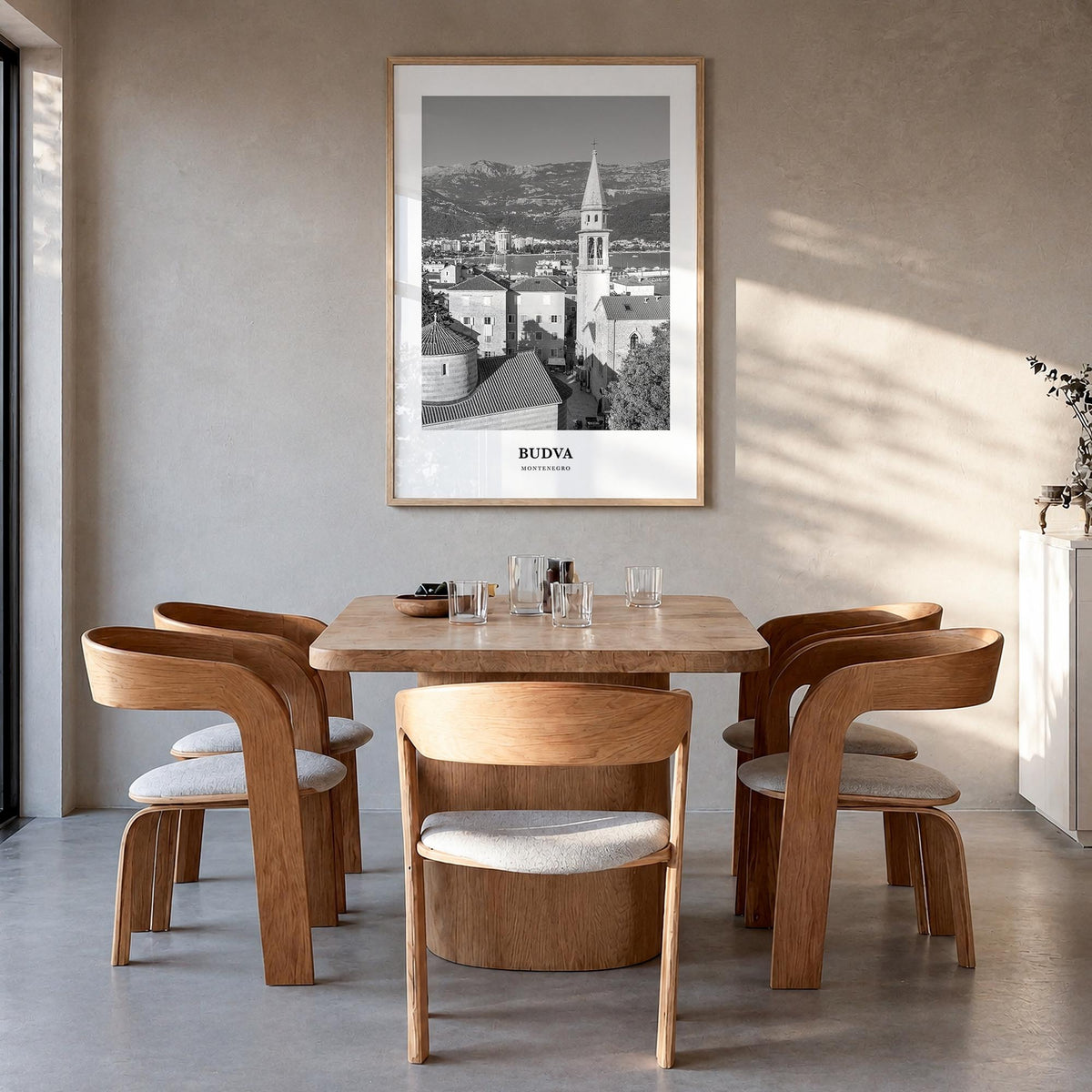 Budva black & white classic poster of Montenegro – vertical wall art in natural wood frame, hanging on wall