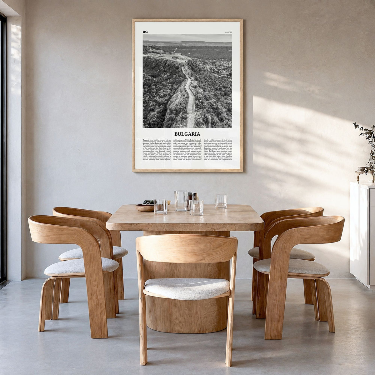 Bulgaria Newspaper Poster in a natural wood frame, hanging in a dining room