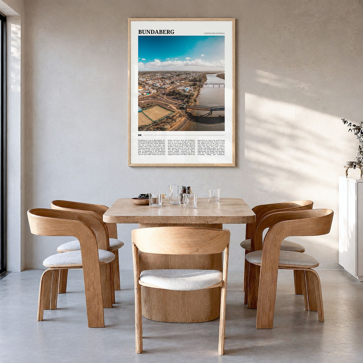 Bundaberg Travel No 1 Poster in a natural wood frame, hanging in a dining room