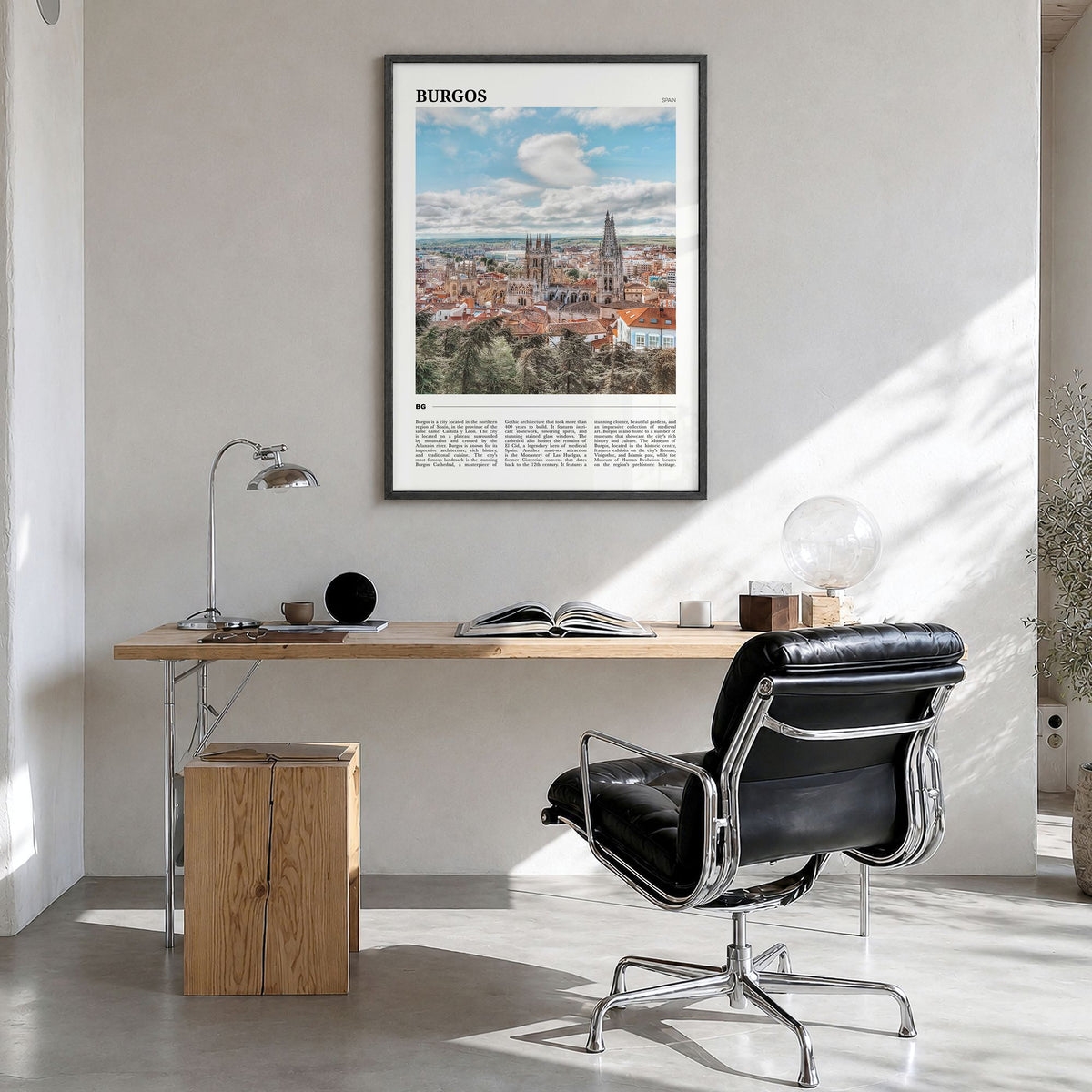 Burgos Travel Poster in a black wood frame, hanging in a bright home office