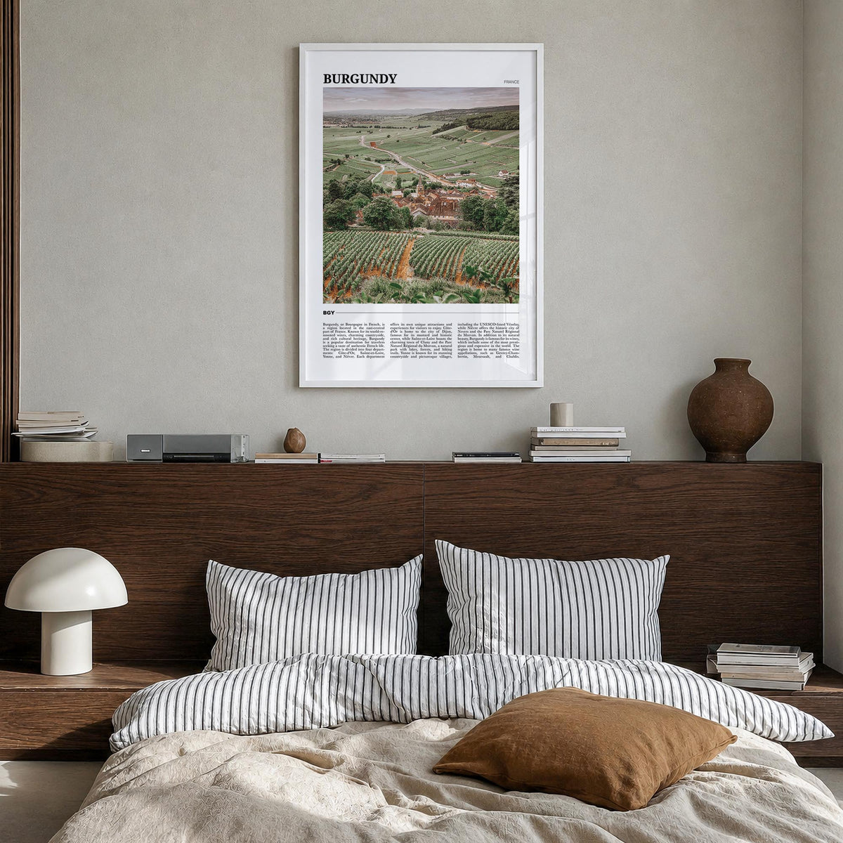 Burgundy colorful travel poster of France – vertical wall art in white wood frame, hanging on wall