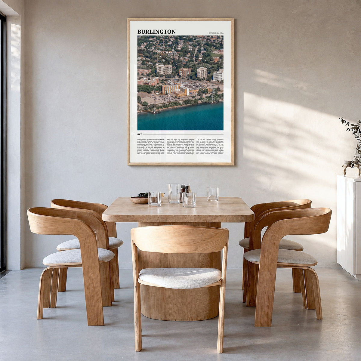 Burlington, Canada Travel Poster in a natural wood frame, hanging in a dining room