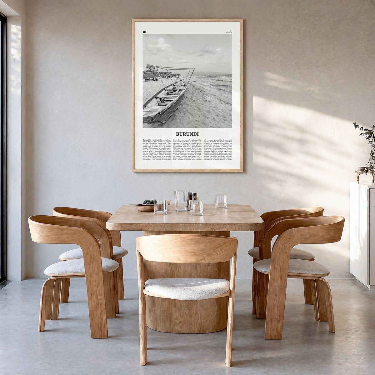 Burundi Newspaper Poster in a natural wood frame, hanging in a dining room