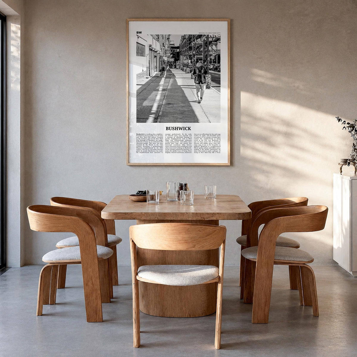 Bushwick black & white newspaper poster of Brooklyn, New York City – vertical wall art in natural wood frame, hanging on wall
