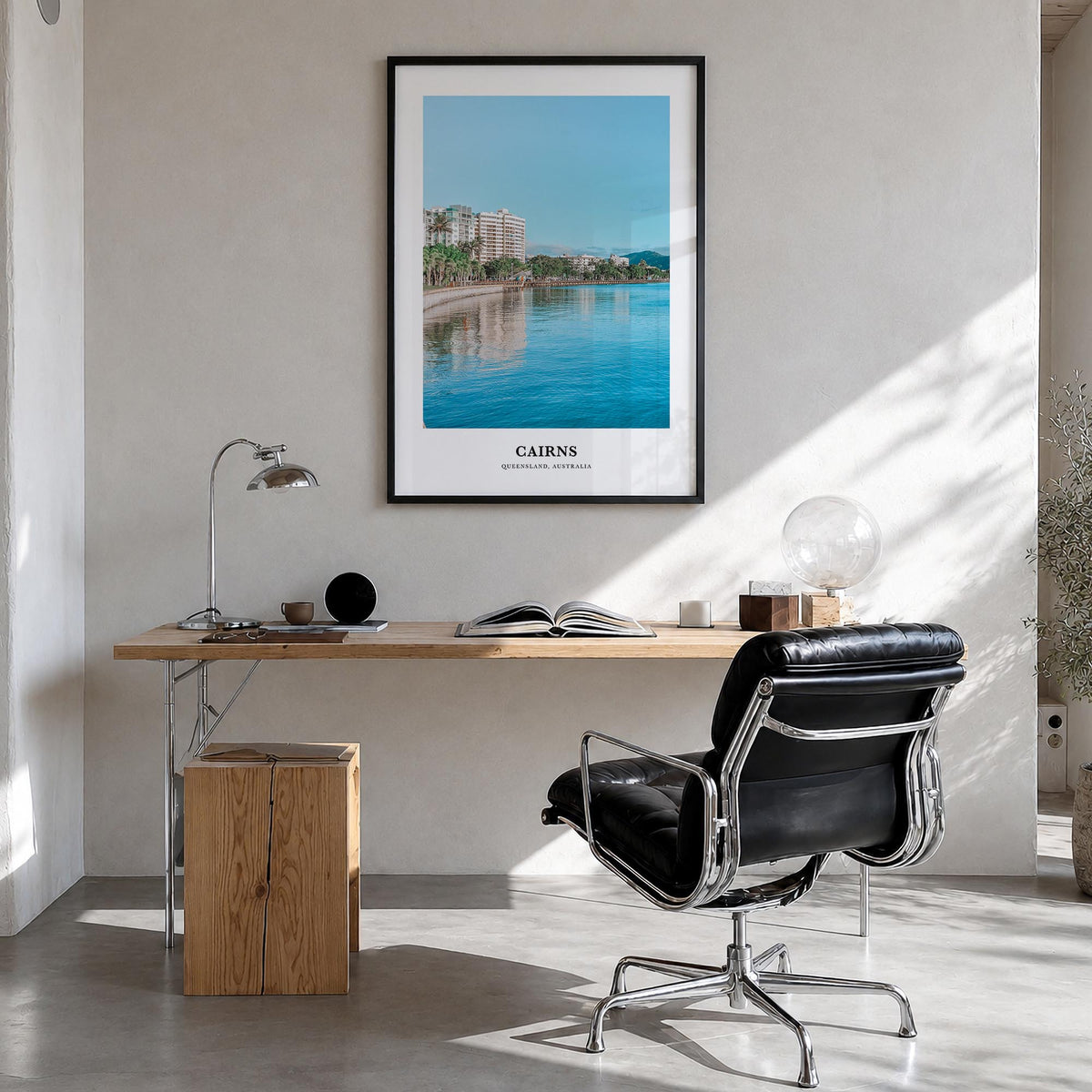Cairns colorful classic poster of Queensland, Australia – vertical wall art in black wood frame, hanging on wall