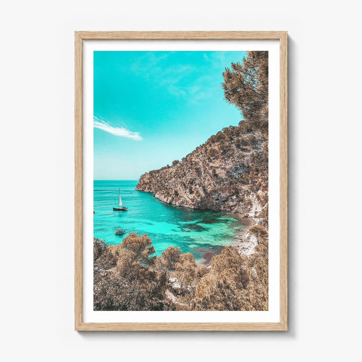 Cala Blanca Photo Poster in a natural wood frame, white border