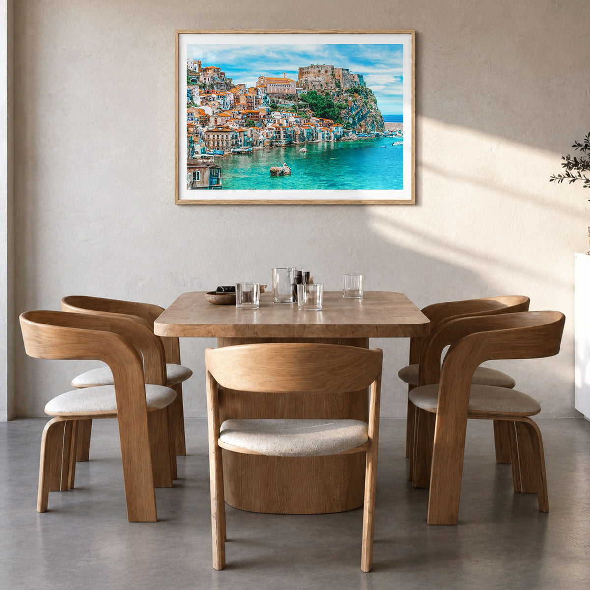 Calabria Photo Poster in a natural wood frame, hanging in a dining room, white border
