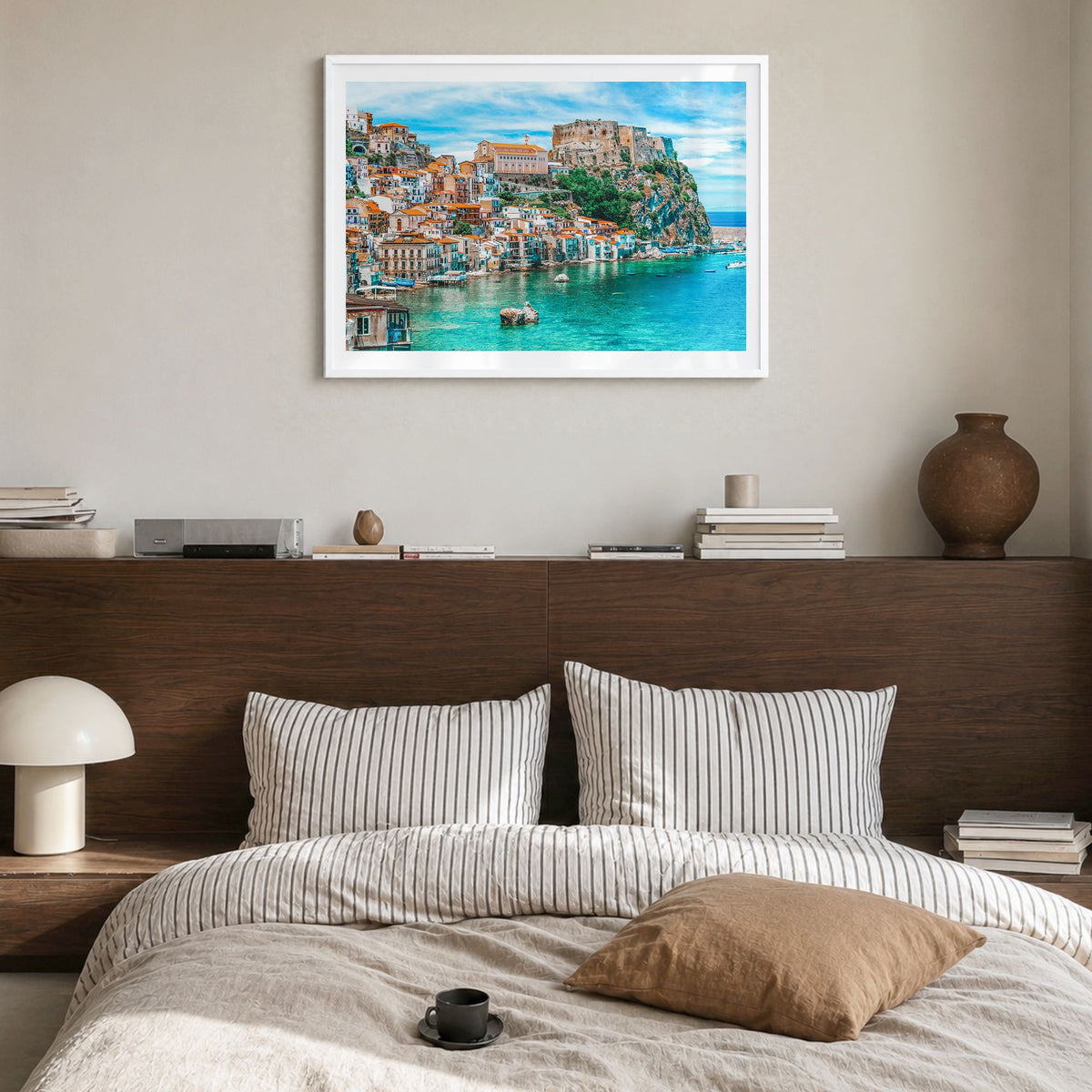 Calabria Photo Poster in a white wood frame, hanging in a bedroom, white border