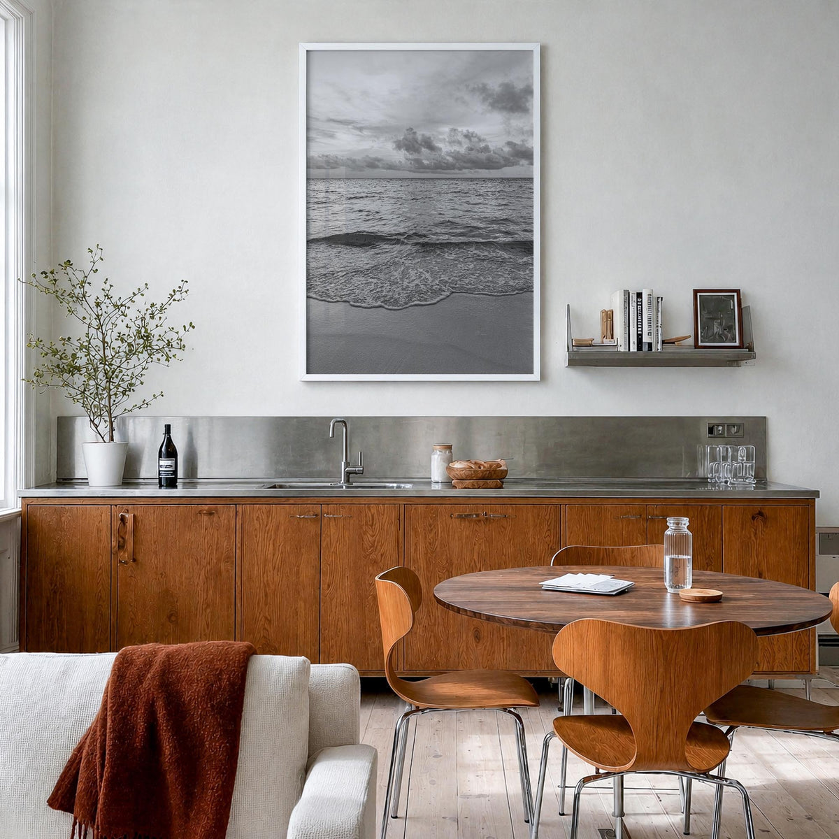 Calm Beach black & white photo poster – vertical wall art in white wood frame, hanging on wall
