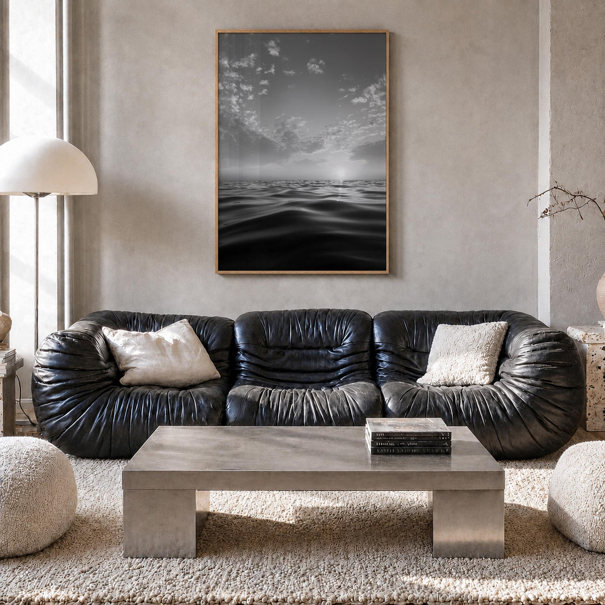 Calm Sunset black & white photo poster – vertical wall art in natural wood frame, hanging on wall
