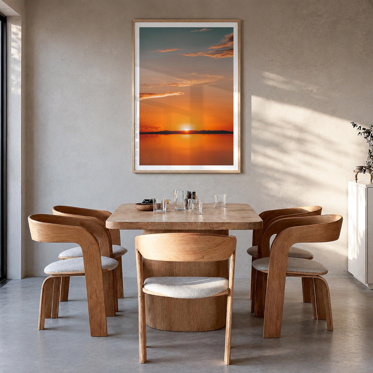 Calm Sunset no. 2 colorful photo poster – vertical wall art in natural wood frame with white border, hanging on wall