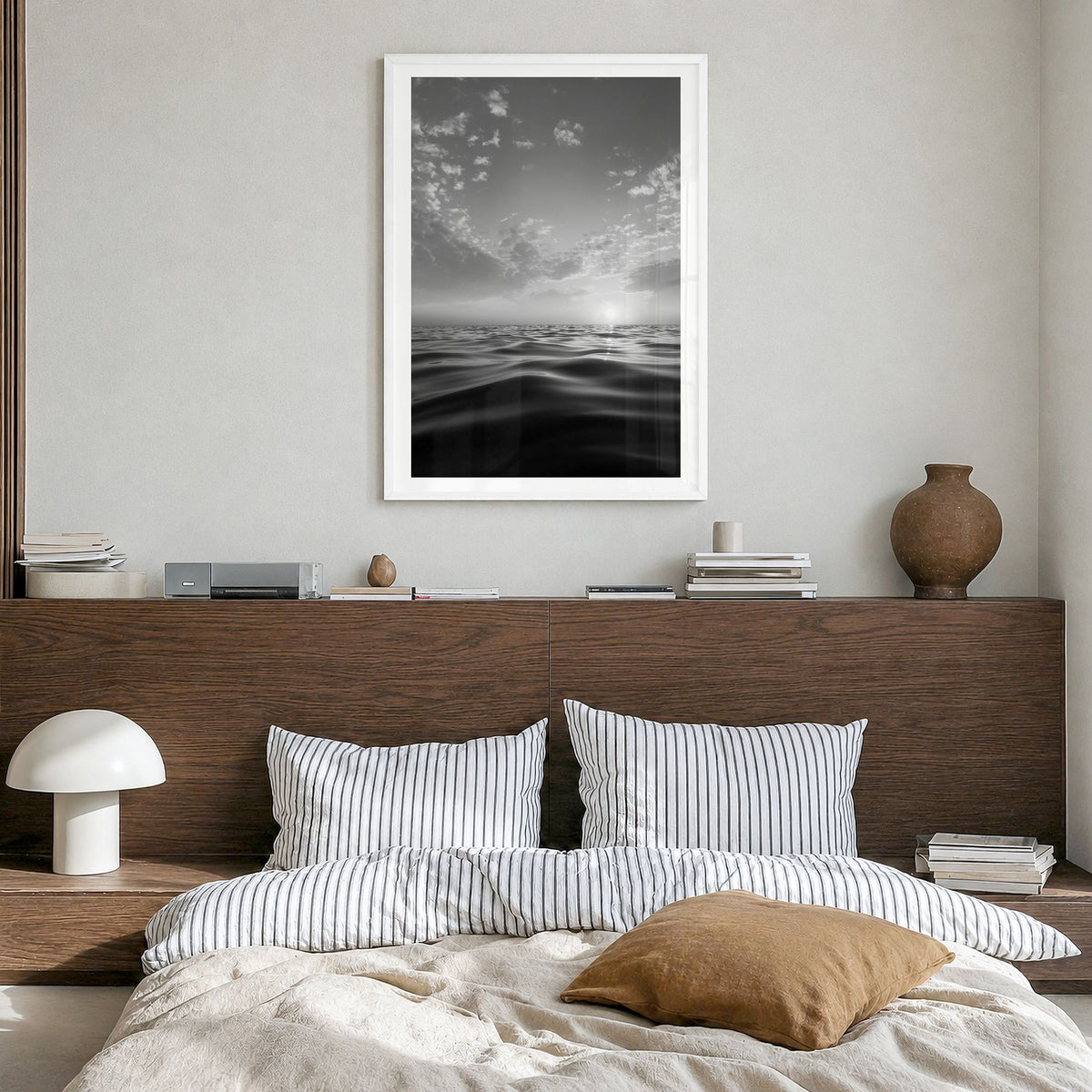 Calm Sunset Photo Poster in a white wood frame, hanging in a bedroom, white border