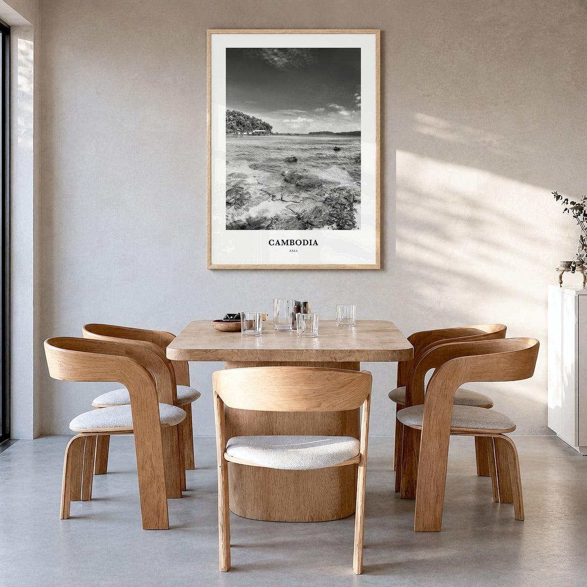 Cambodia Classic No 1 Poster in a natural wood frame, hanging in a dining room