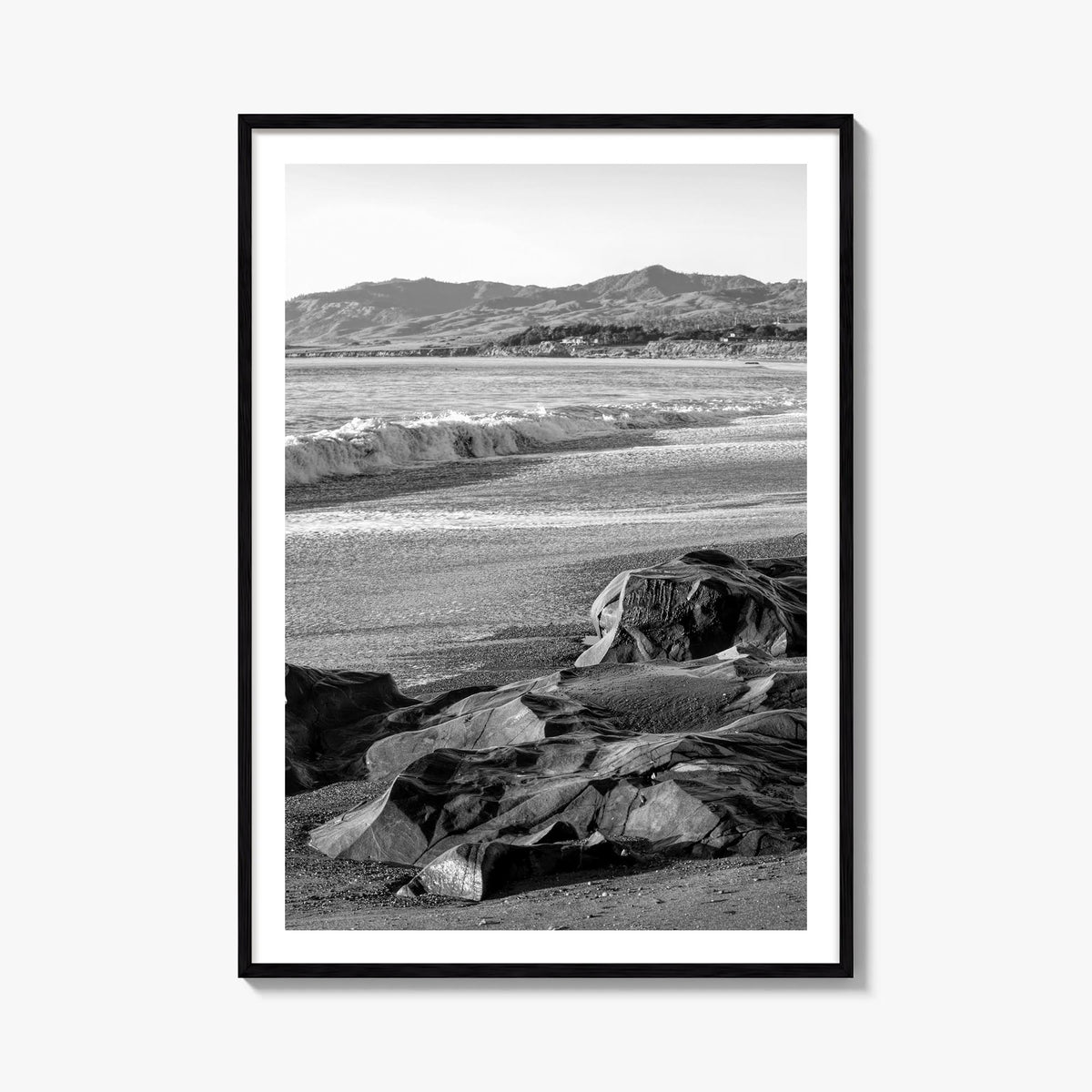 Cambria black & white photo poster of California, USA – vertical wall art, unframed print shown in interior mockup