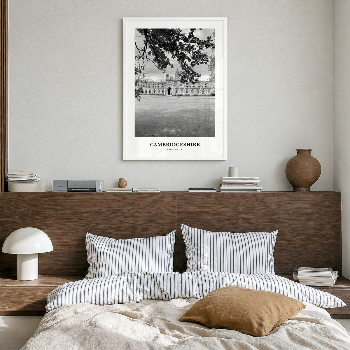 Cambridgeshire Classic Poster in a white wood frame, hanging in a bedroom