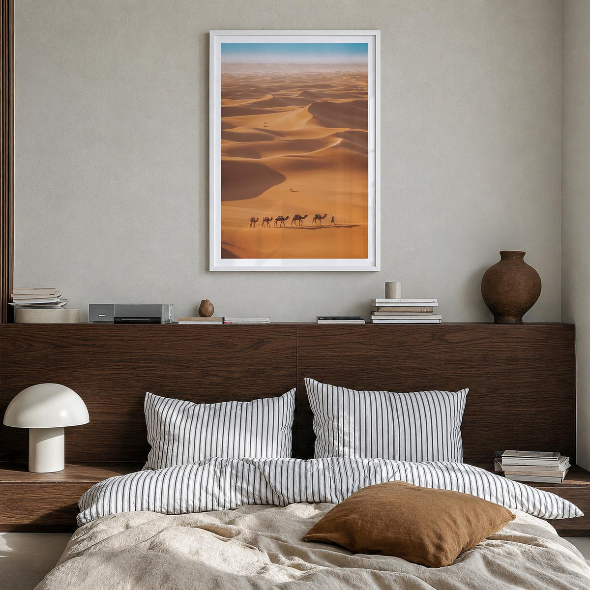 Camel Caravan colorful photo poster – vertical wall art in white wood frame with white border, hanging on wall