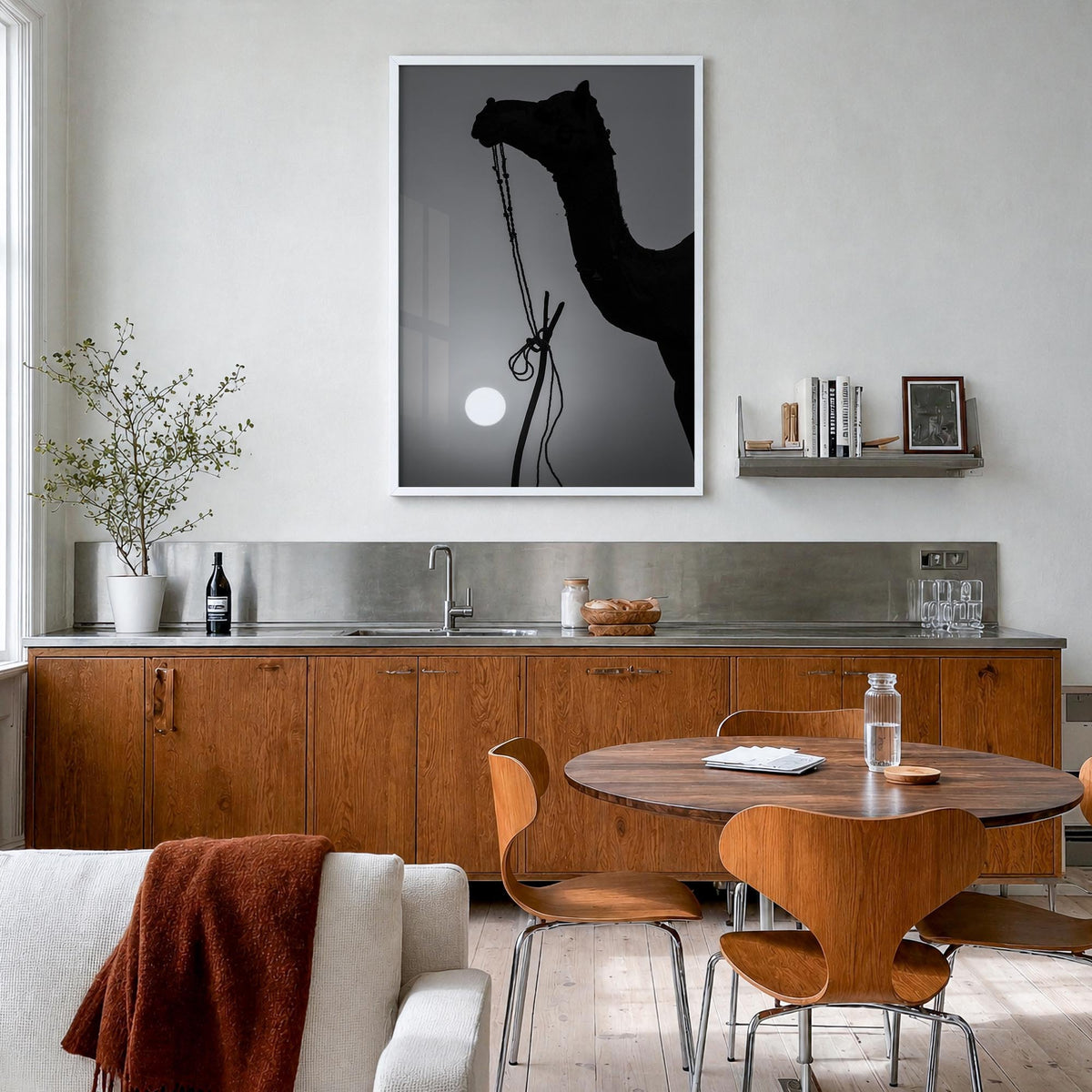 Camel Caravan no. 1 black & white photo poster – vertical wall art in white wood frame, hanging on wall