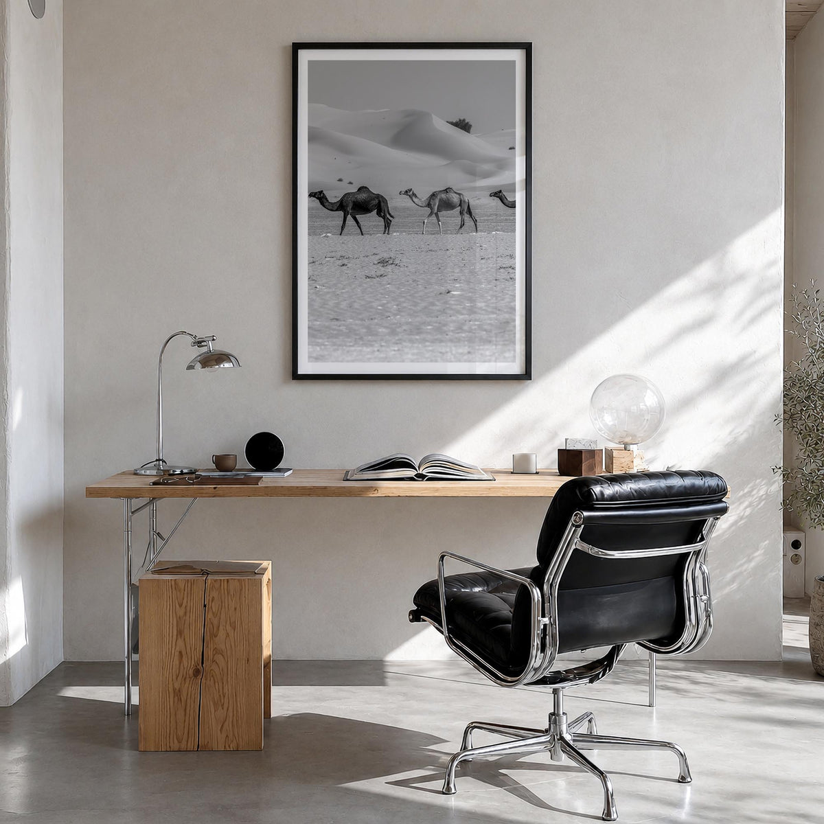 Camel Caravan no. 2 black & white photo poster – vertical wall art in black wood frame with white border, hanging on wall