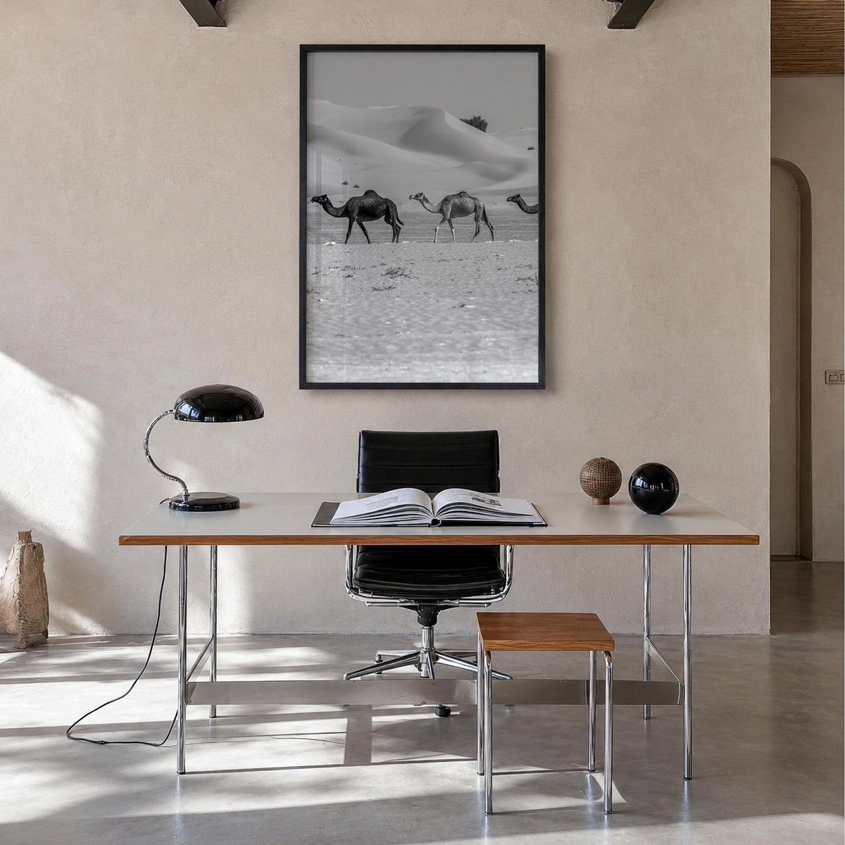 Camel Caravan no. 2 black & white photo poster – vertical wall art in black wood frame, hanging on wall