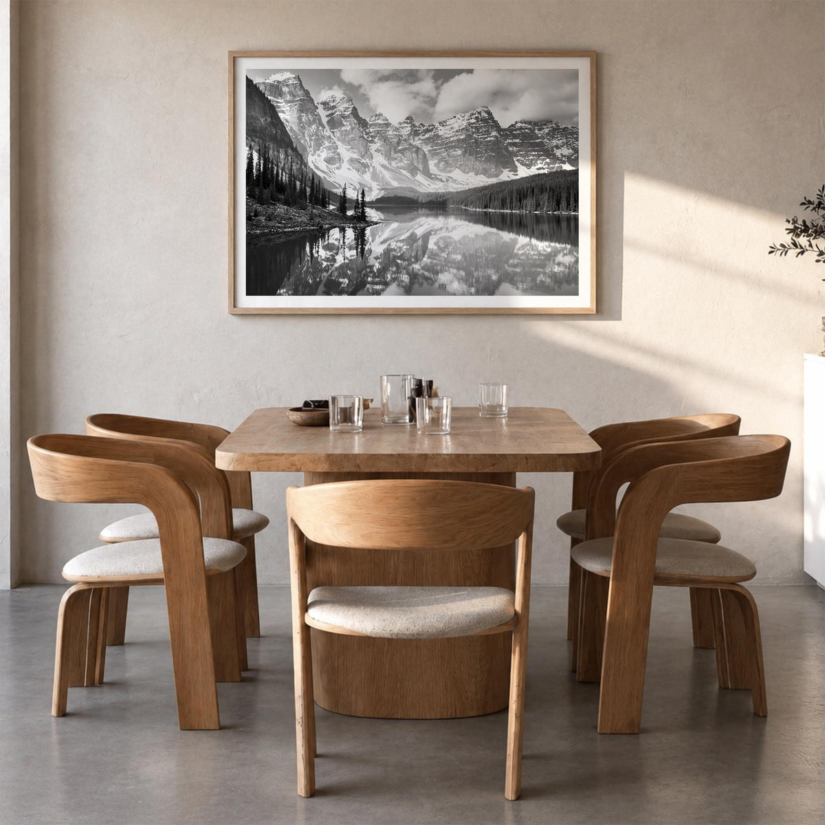 Canada black & white photo poster of North America – horizontal wall art in natural wood frame with white border, hanging on