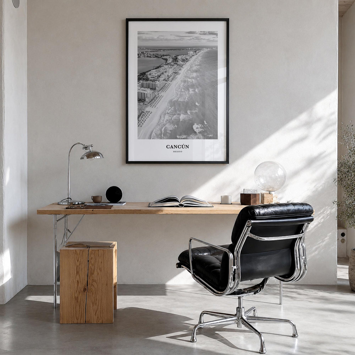 Cancún black & white classic poster of Mexico – vertical wall art in black wood frame, hanging on wall