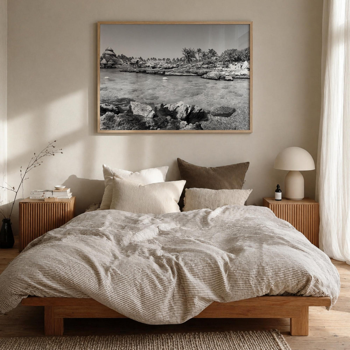 Cancún black & white photo poster of Mexico – horizontal wall art in natural wood frame, hanging on wall