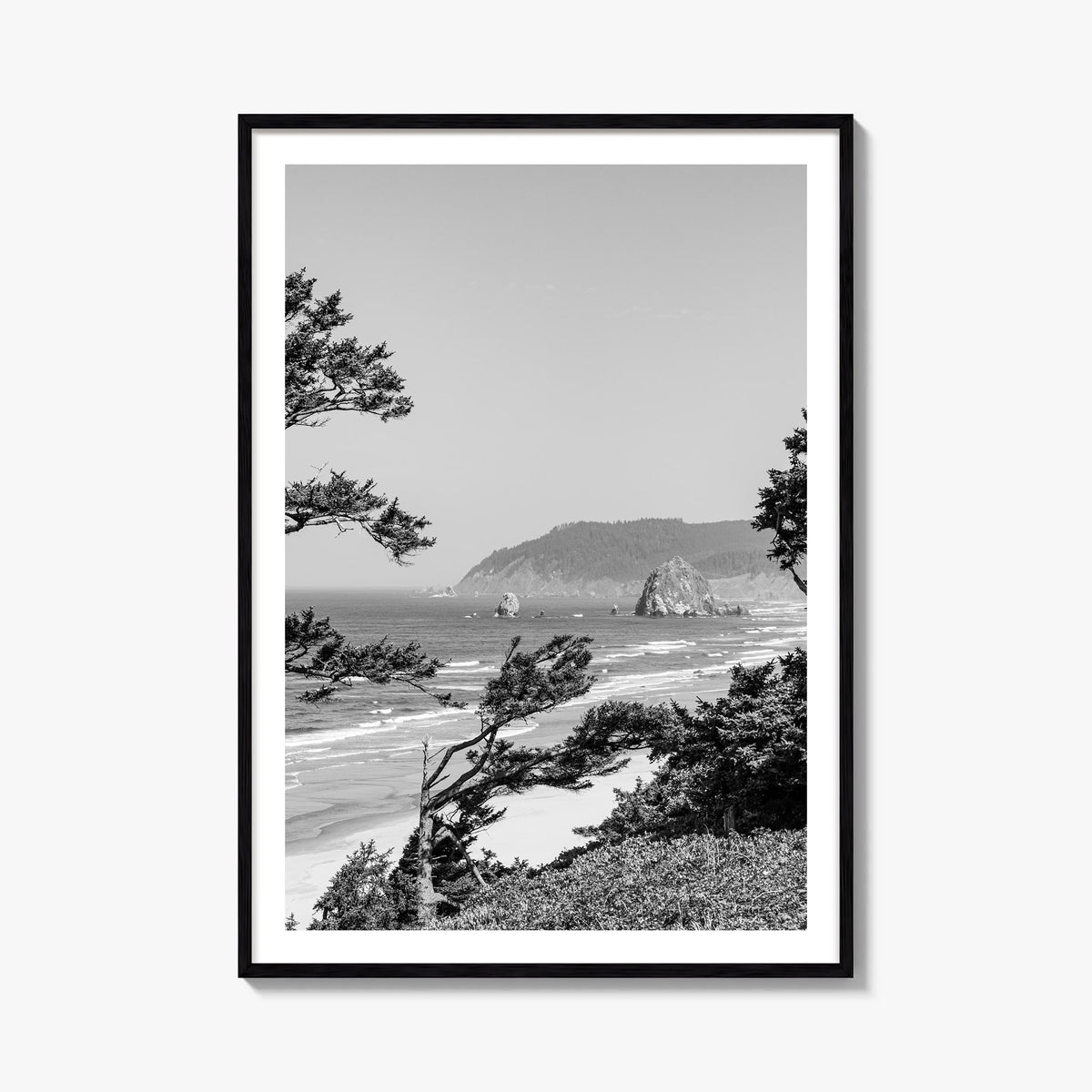 Cannon Beach black & white photo poster of Oregon, USA – vertical wall art, unframed print shown in interior mockup