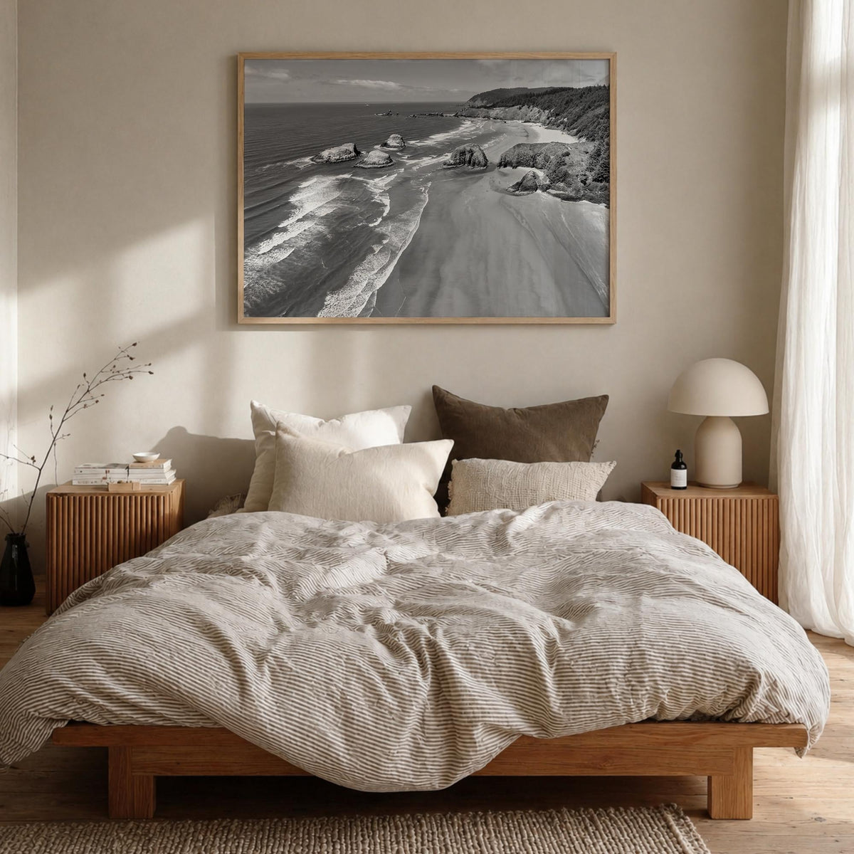 Cannon Beach black & white photo poster of Oregon, USA – horizontal wall art in natural wood frame, hanging on wall