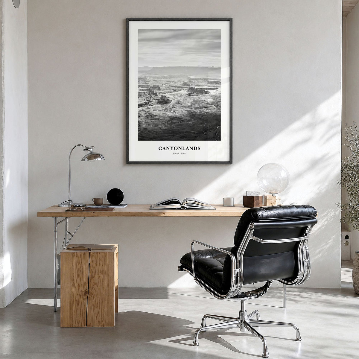 Canyonlands National Park Classic Poster in a black wood frame, hanging in a bright home office