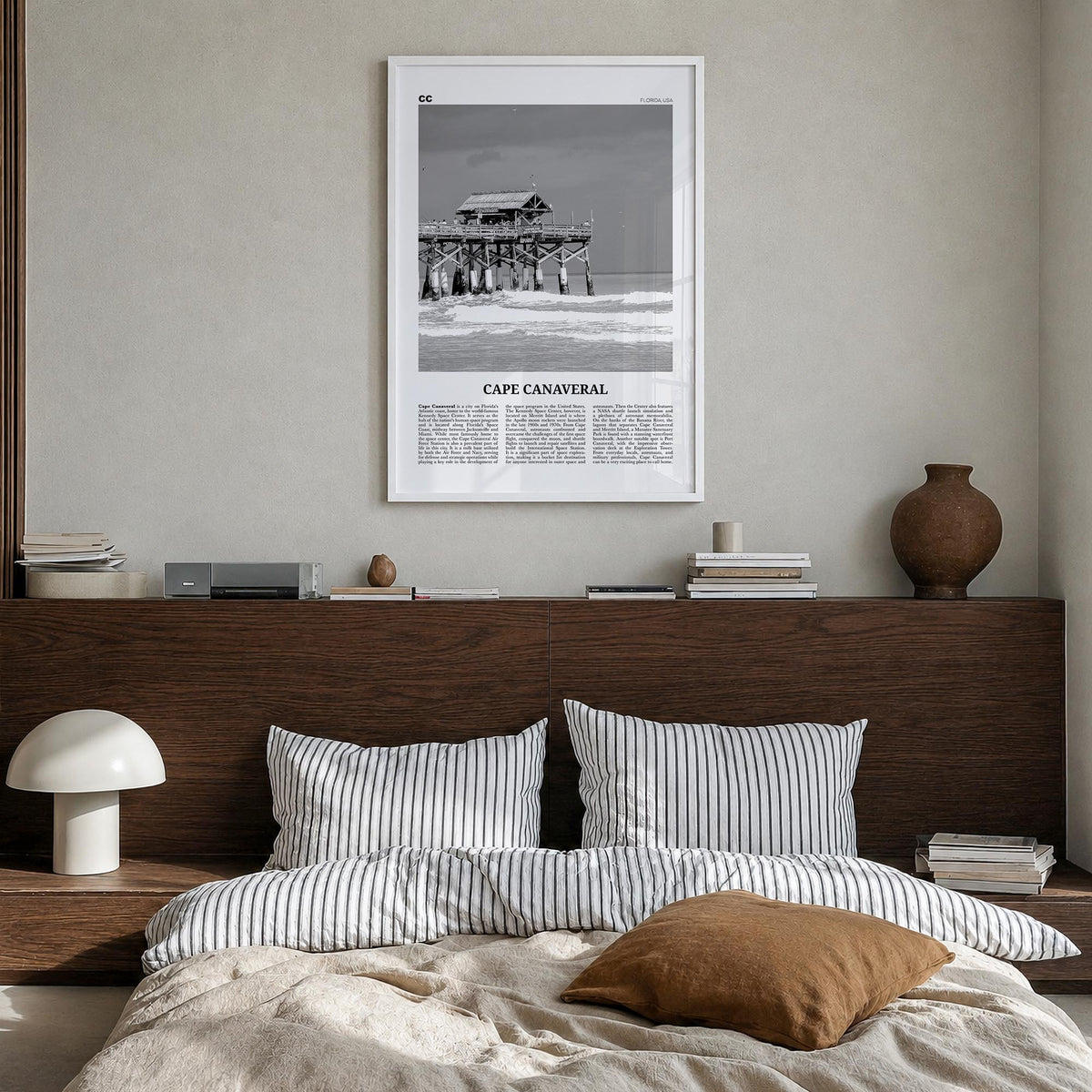 Cape Canaveral black & white newspaper poster of Florida, USA – vertical wall art in white wood frame, hanging on wall
