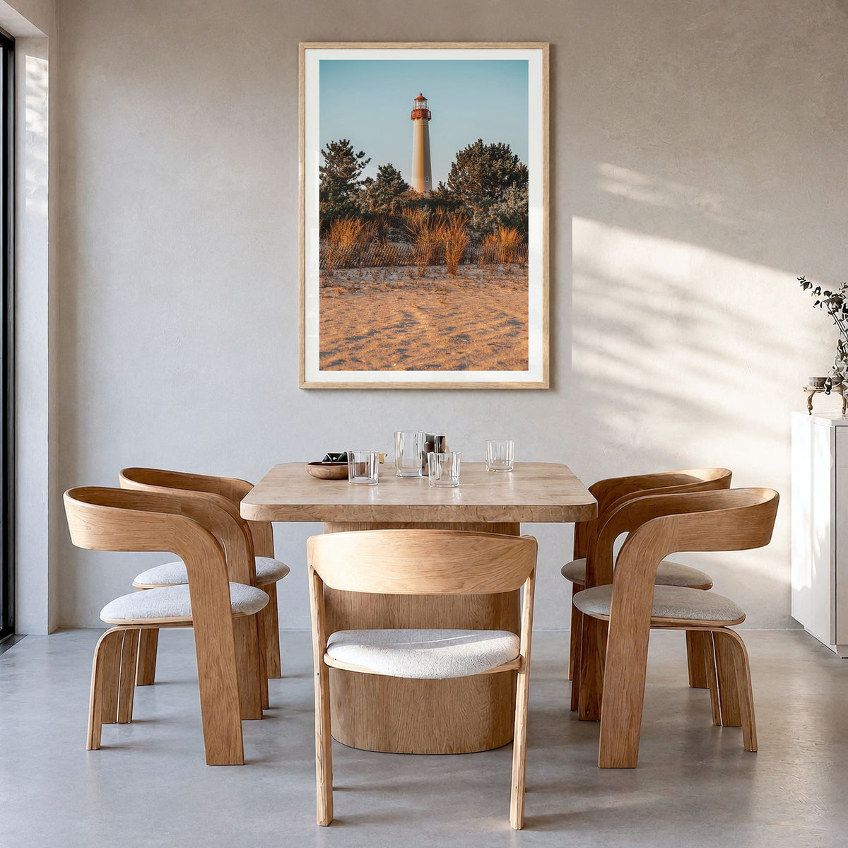 Cape May Photo Poster in a natural wood frame, hanging in a dining room, white border