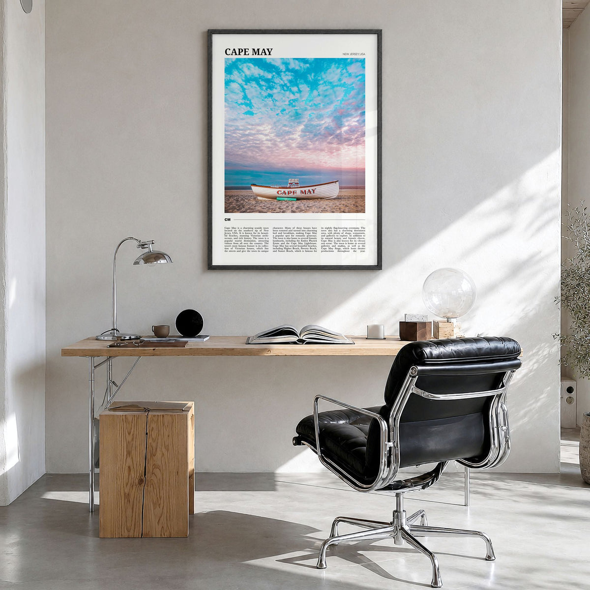Cape May Travel Poster in a black wood frame, hanging in a bright home office