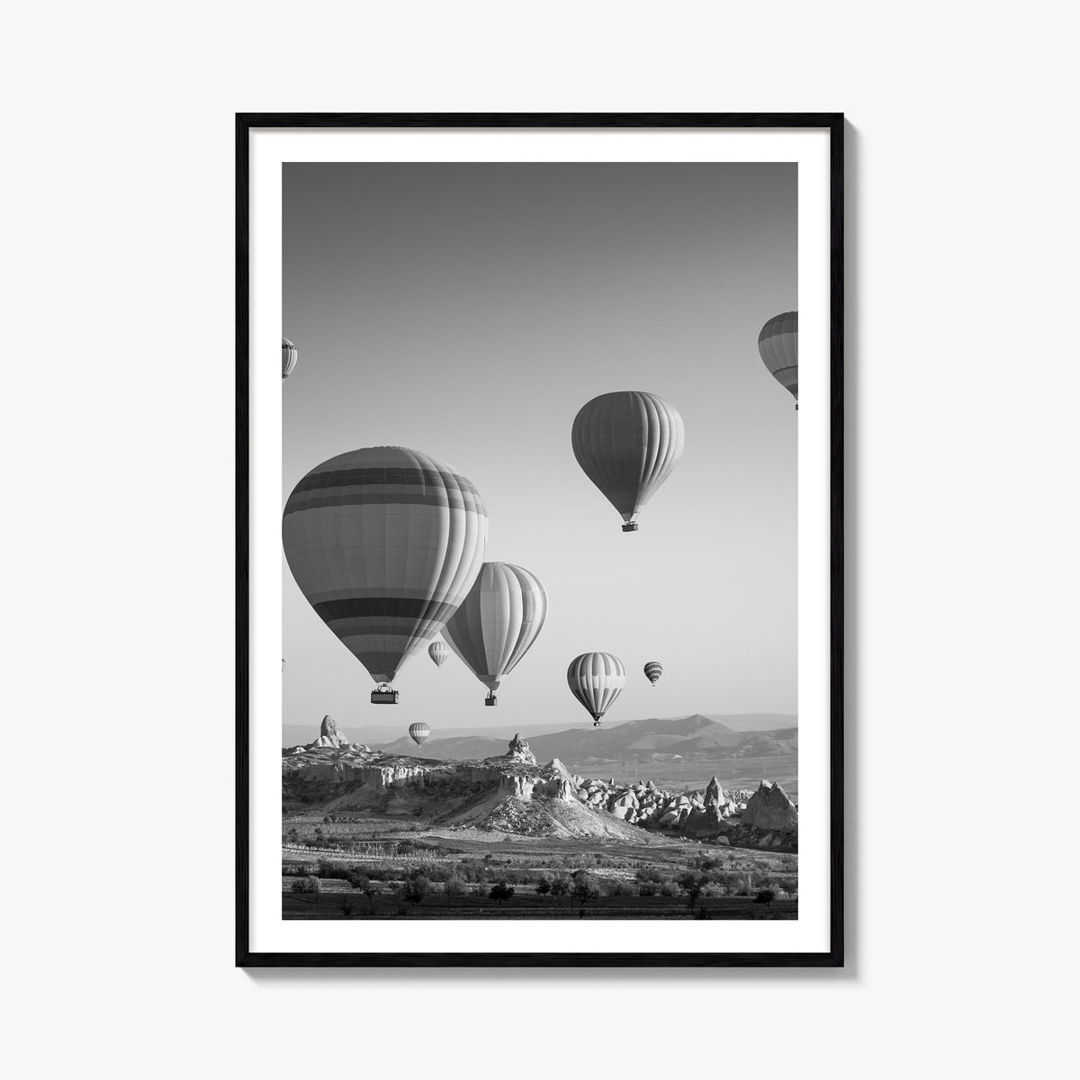 Cappadocia black & white photo poster of Türkiye – vertical wall art, unframed print shown in interior mockup